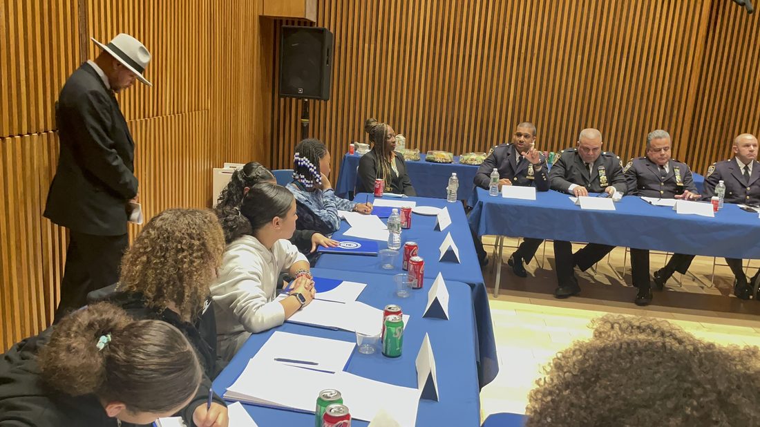 Dorill youth and NYPD leadership at a community panel